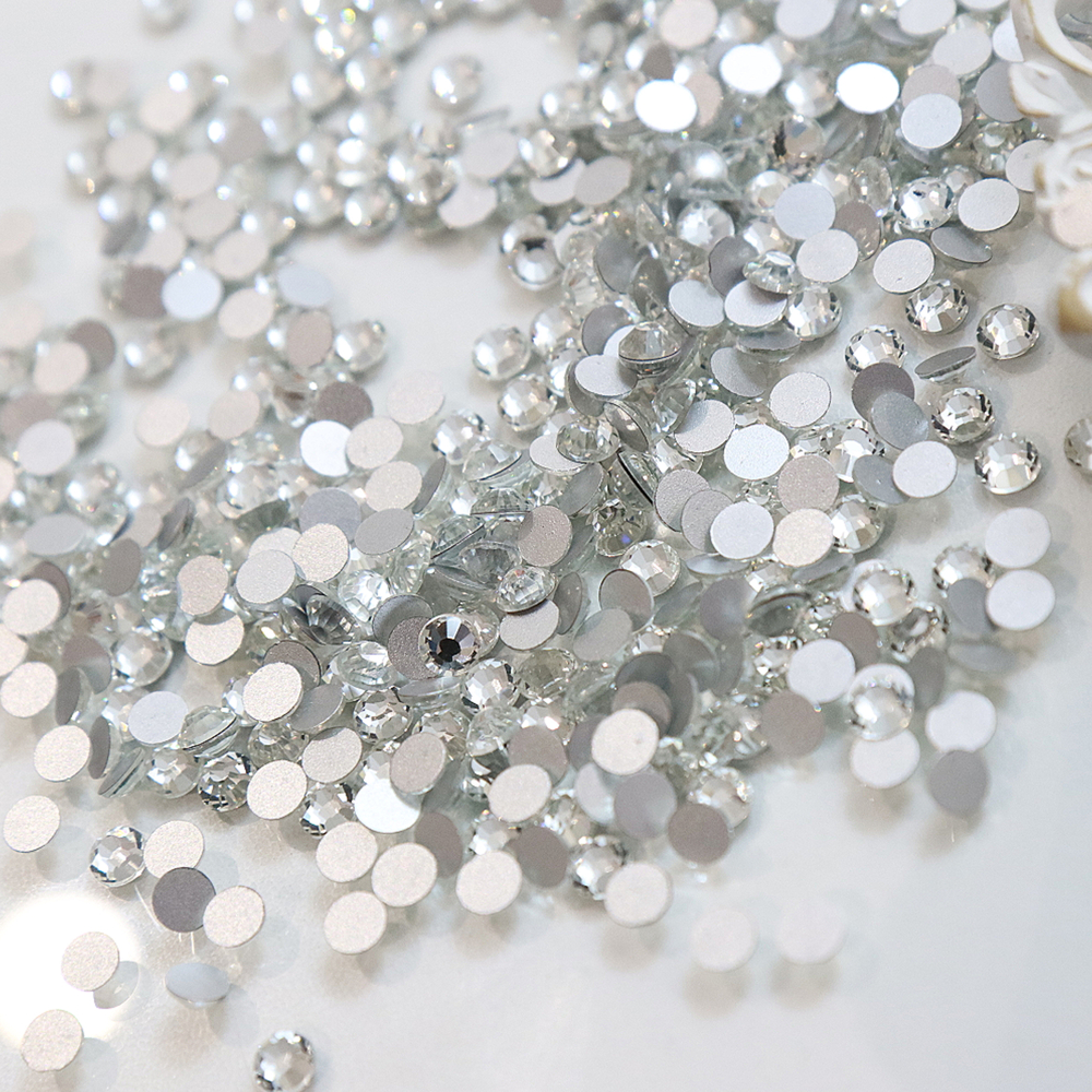 Детальное фото декоративной фигурки "Стразы  набор 140 шт. Цвет прозрачные.Стекло. Выберите нужный диаметр ." из пластика - магазин Ариши